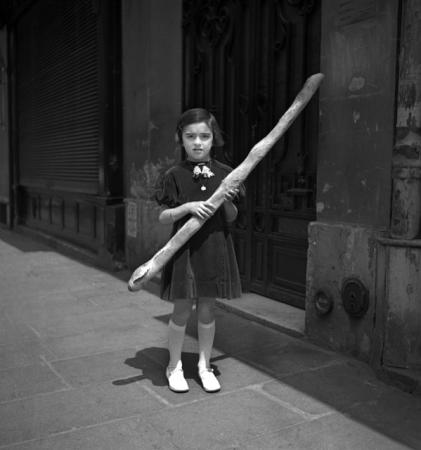 Girl with baguette, Paris, 1936, Maynard Owen Williams